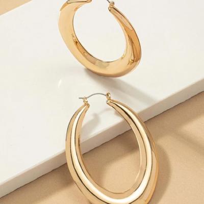 Very Carrot Large puffy hollow oval hoop earrings