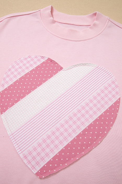 - Patchwork Heart Cozy Sweatshirt
