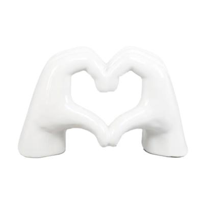 7.5"L White Ceramic Heart Hand 