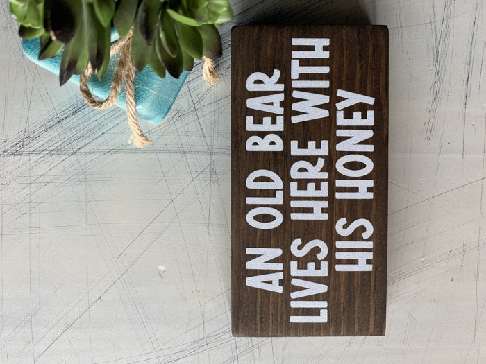 An old bear lives here with his honey - mini wood sign