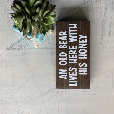 An old bear lives here with his honey - mini wood sign