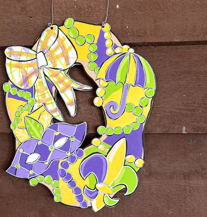 Hand-Painted Mardi Gras King Cake Door Hanger – Festive & Fun