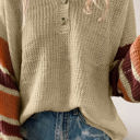  Striped Sleeve Drop Shoulder Knit Top