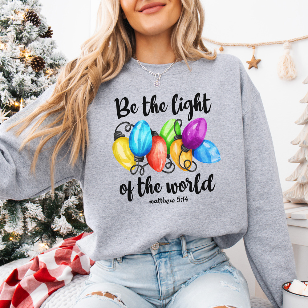 Christmas Bible Verse 'Be The Light' Holiday Bella Canvas Sweater