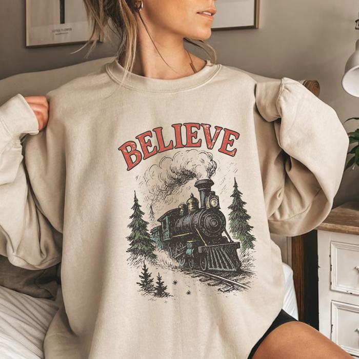 Believe Christmas Train Sweatshirt, Vintage Holiday Crewneck – Polar Express Style Graphic, Cozy Christmas Outfit, Winter Gift for Her