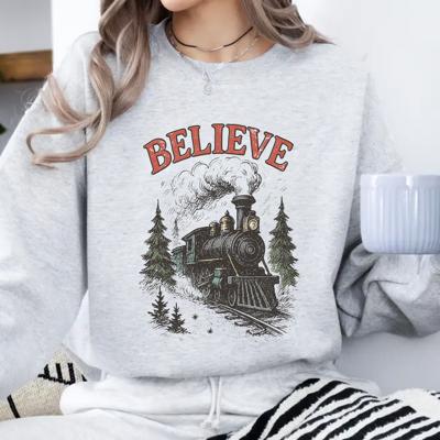 Believe Christmas Train Sweatshirt, Vintage Holiday Crewneck – Polar Express Style Graphic, Cozy Christmas Outfit, Winter Gift for Her