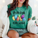  Christmas Bible Verse 'Be The Light' Holiday Comfort Colors Tee