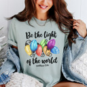  Christmas Bible Verse 'Be The Light' Holiday Comfort Colors Tee