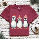 Small (UNISEX) Penguins: Chili Vintage Christmas T-Shirts – Retro Holiday Tees with Santa, Snowman, Reindeer, and Festive Nostalgia
