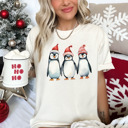 Small (UNISEX) Penguins: Ivory Vintage Christmas T-Shirts – Retro Holiday Tees with Santa, Snowman, Reindeer, and Festive Nostalgia