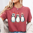 Small (UNISEX) Penguins: Crimson Vintage Christmas T-Shirts – Retro Holiday Tees with Santa, Snowman, Reindeer, and Festive Nostalgia
