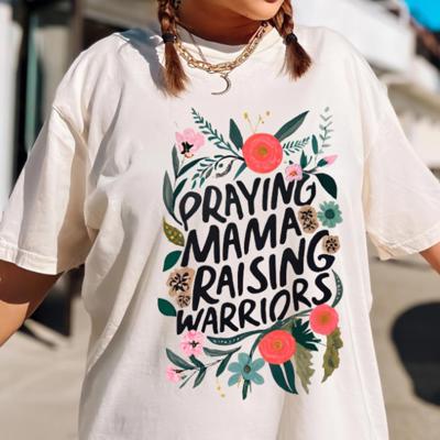 Praying Mama Raising Warriors Floral Comfort Colors Tee – Faith-Based Mom Shirt for Women, Christian Motherhood Graphic Tee Inspired by Psalm 127