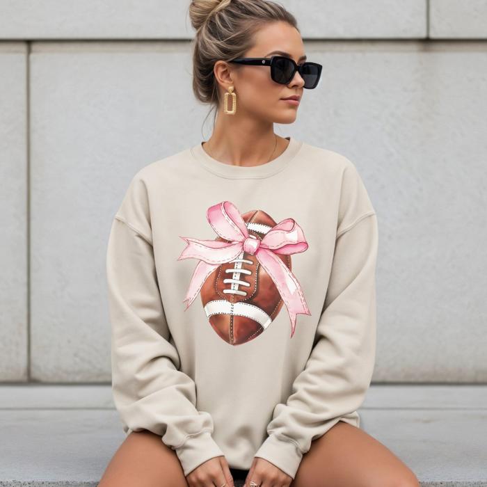 Football Coquette Bow Women’s Sweatshirt, Cozy and Stylish Game Day Apparel for Women, Sporty Outfit for Women