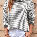  Alaia Striped Turtleneck Loose Sweater