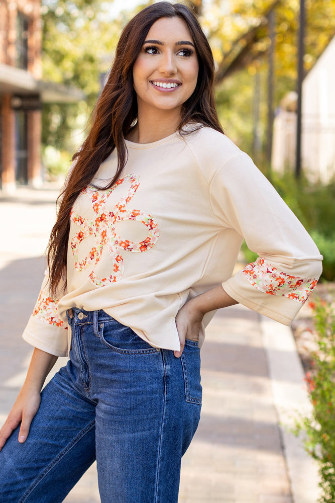 Flower Exposed Seam Wide Sleeve Top