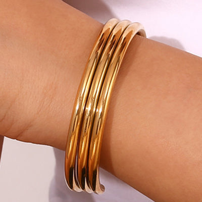 Gold Three Layered Notched Design Bangle