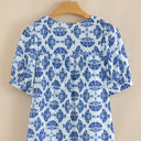  Grace Geometric Tassel Drawstring V Neck Blouse