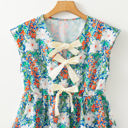  Indigo Floral Bow Applique Slit Sleeveless Peplum Blouse
