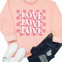 Large Peach Checker Background Love Graphic Sweatshirt