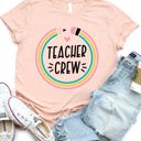 Small Peach Teacher Crew Graphic Tee