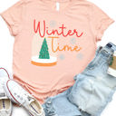 Small Peach Winter Time Snow Globe Graphic Tee