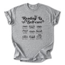 Small Heather Reading is Self-Care Cotton T-Shirt | Inspirational Book Design | Escape Reality, Better Yourself  | Graphic Tee for Book Lovers