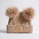Beige | Newborn - 12 Month C.C® Baby Beanie Pom Criss-Cross Hats by Truly Contagious