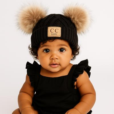 C.C® Baby Beanie Pom Criss-Cross Hats by Truly Contagious